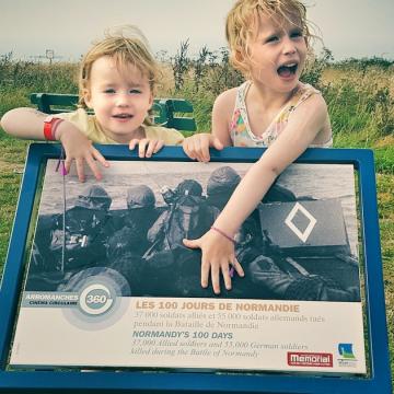 Children outside Arromanches 360 in Normandy